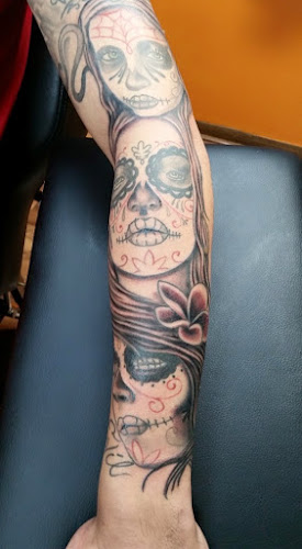 Work by Mind Floss Tattoo Shop