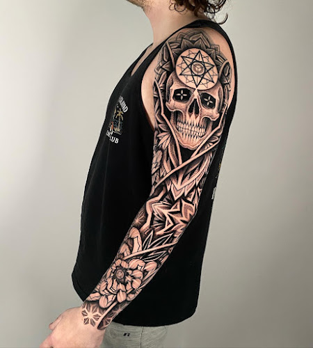 Work by Sleepy Reaper Tattoo