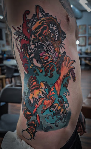 Work by The Gilded Dagger Tattoo