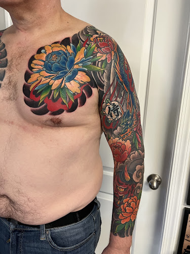 Work by American Tradition Tattoo Studio