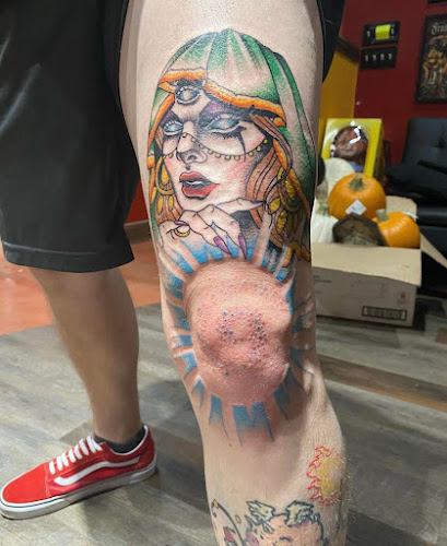 Work by 100 Proof Tattoo