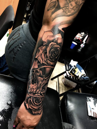 Work by Top Tier Tattoos and Body Piercings