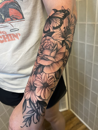 Work by Chariot Tattoo