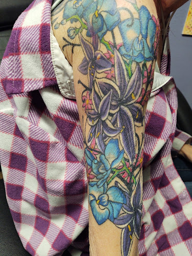 Work by Passionfish Tattoo Studio