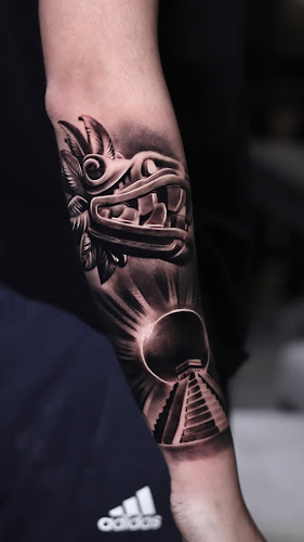 Work by InkDozer tattoo studio