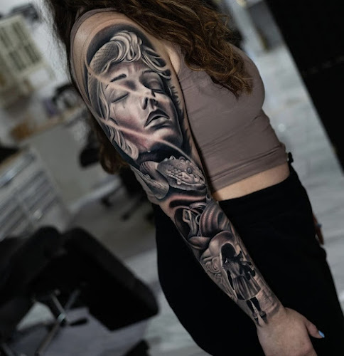 Work by Visual Impact Tattoo Gallery