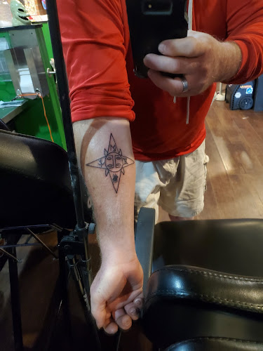 Work by The Creature's Den tattoos, piercing and more