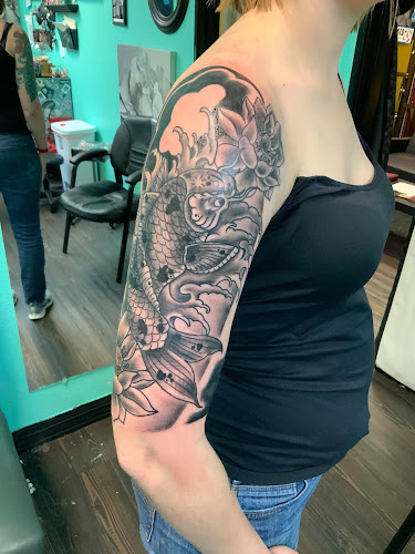 Work by Borrowed Time Fine Art Gallery Tattoo Shop