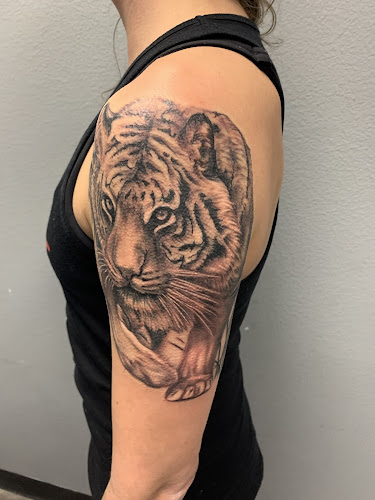 Work by Boss Frog Tattoos