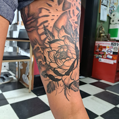 Work by Art In Motion Inc Tattooing