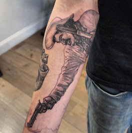 Work by Oblivion East Tattoos & Fine Art