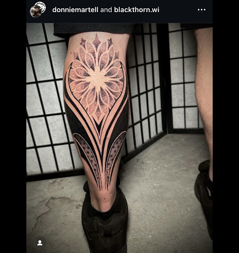 Work by Black Thorn Tattoo