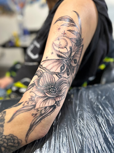 Work by Heaven Cent Tattoo