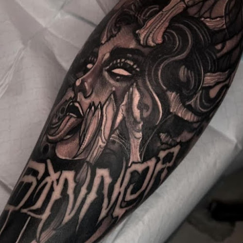 Work by Cobra Lounge Tattoo