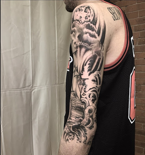 Work by Hand of Fate Tattoo