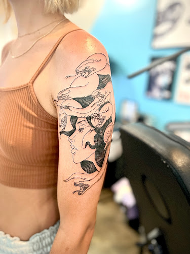 Work by Surfing Samurai Tattoo