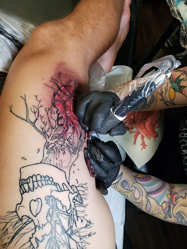 Work by Mortuary Tattoo