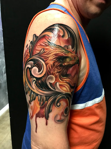 Work by Next Wave Tattoos and Piercings