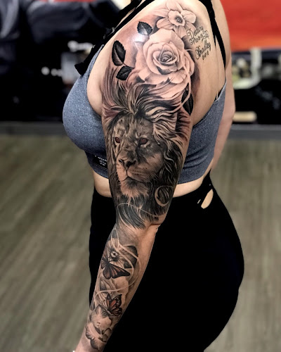 Work by Smiley Ink Tattoos