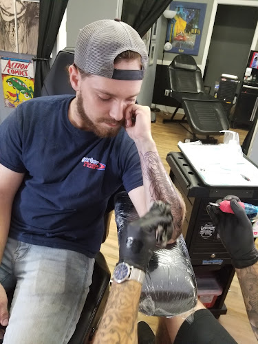 Work by Uptown Ink Tattoo Parlor