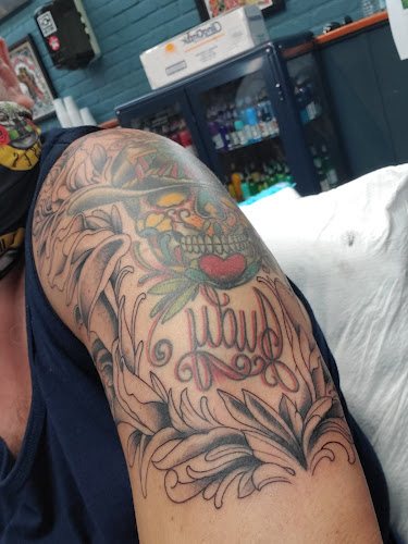 Work by Miami Ink - Love Hate Tattoos