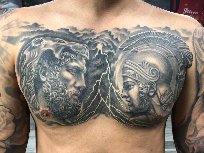 Work by Inkaholik Tattoos and Barbershop North Miami