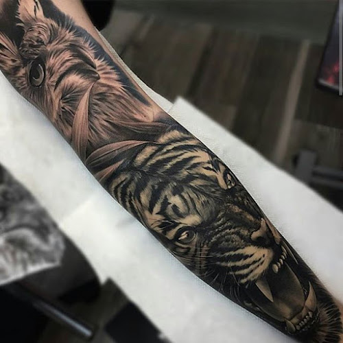 Work by INKAHOLIK TATTOOS AND BARBERSHOP