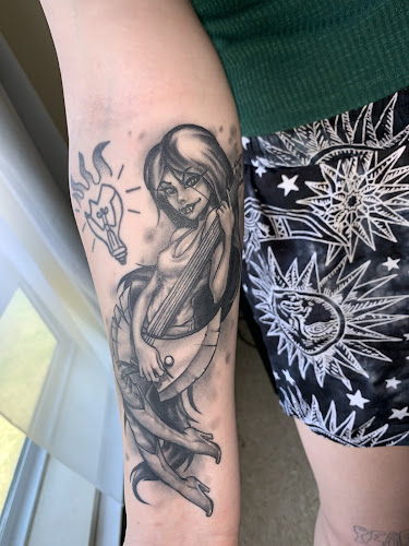 Work by No Man's Land Tattoo Parlor