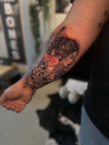 Work by The Howling Wolf Tattoo Collective