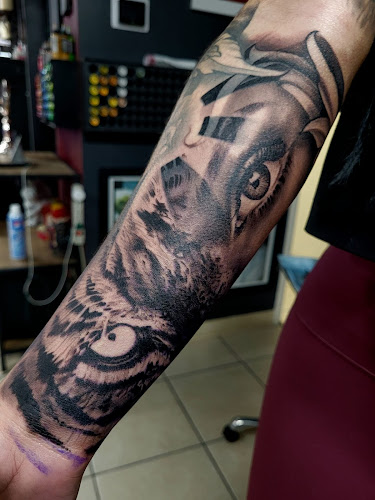 Work by Good Faith Tattoo Studio