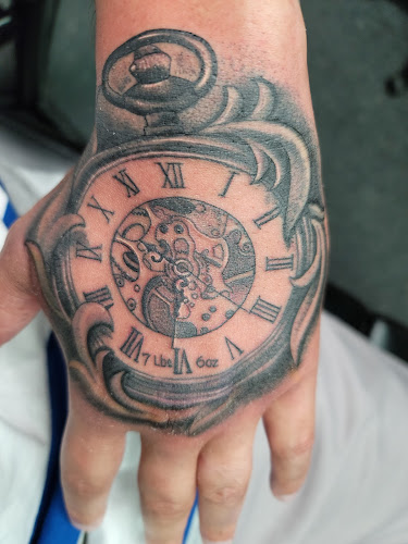 Work by Hired Guns Tattoo
