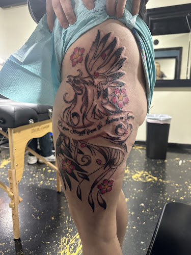 Work by Rise Above Tattoo Studio