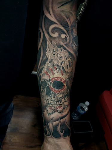 Work by Vivid Art Tattoos