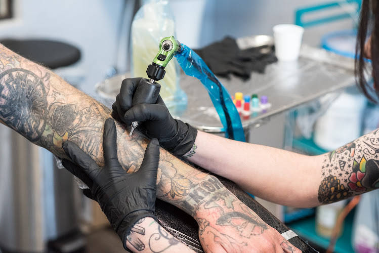 Work by Kustom Tattoo Club