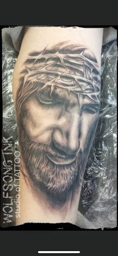 Work by Wolf Song Ink Studio of Tattoos