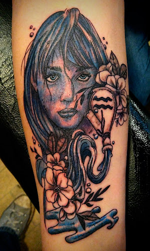 Work by Big John's Tat Shop
