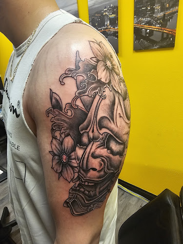Work by 412Inkd Tattoo Studio