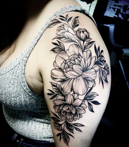 Work by Garage Ink Tattoo