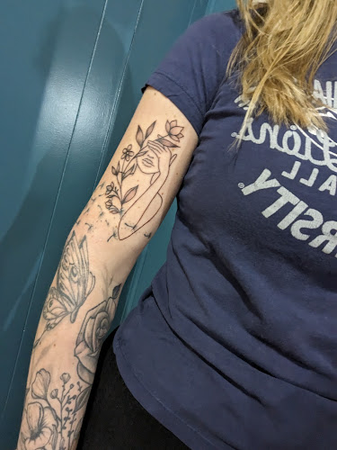 Work by Needles of Fury Tattoo