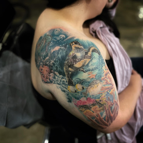 Work by Hidden Leaf Tattoo
