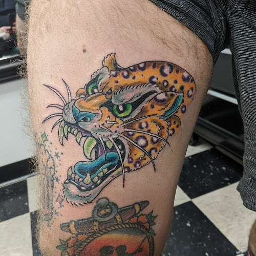 Work by Ol' Skool Tattoos