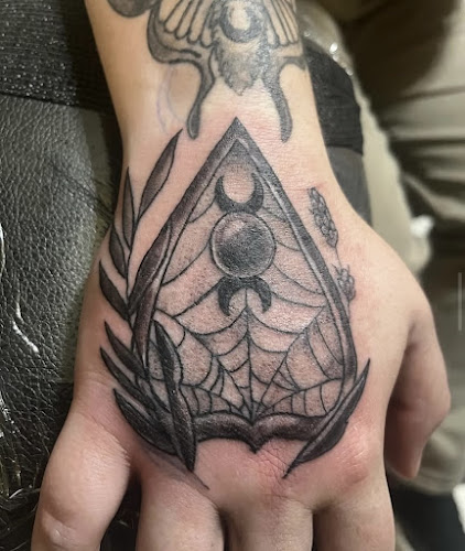 Work by Original Cat Tattoo Studio