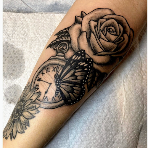 Work by Flying Tiger Tattoo