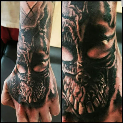 Work by Lone Wolf Tattoo Gallery