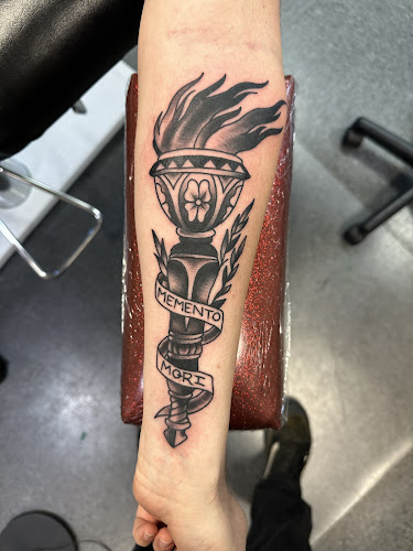 Work by 909 Tattoo Company