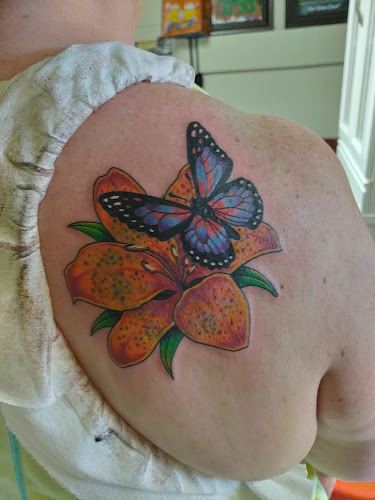 Work by Youth Gone Wild Tattoo Co.