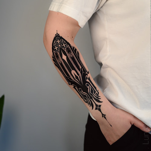 Work by Luna Moth Tattoo