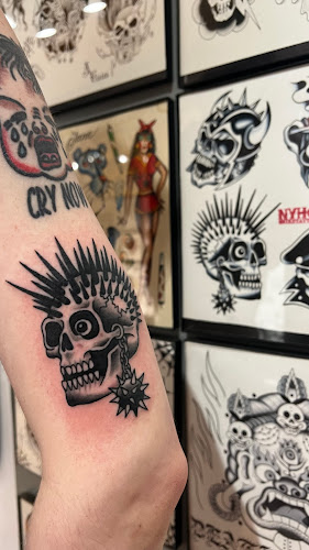 Work by New York Hardcore Tattoos