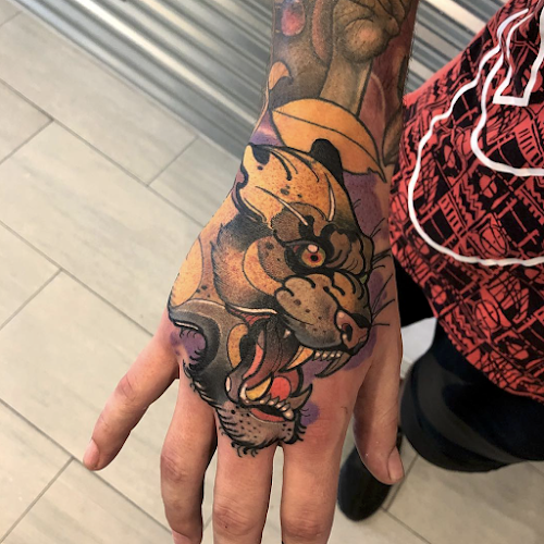 Work by Red Baron Ink Tattoo and Piercing