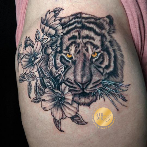 Work by Studio 28 Piercings, Fine Jewelry, and Custom Tattoos